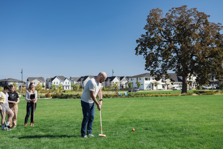 A family plays croquet in South Hillsboro’s Tamarack Park.