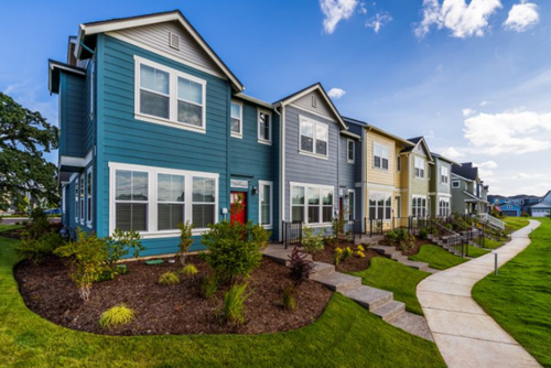 A row of colorful townhomes in Hillsboro, Oregon’s Reed’s Crossing neighborhood.