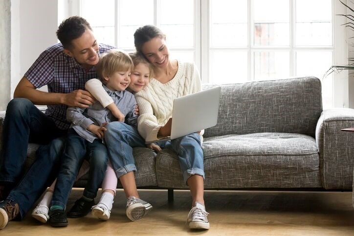 Family on Couch Laptop