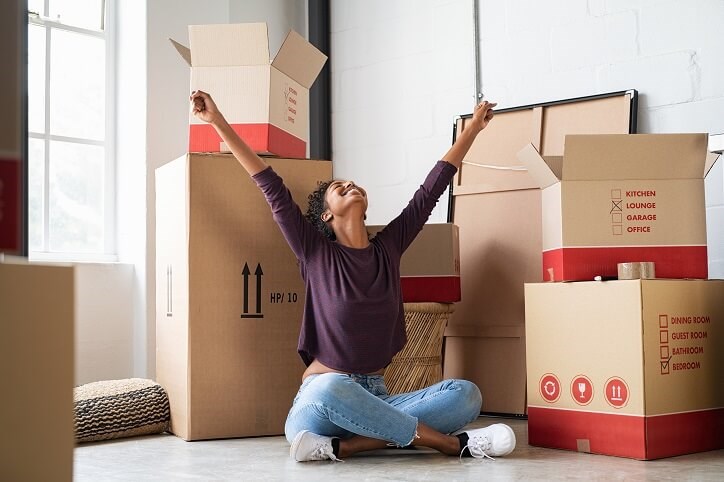 Young Woman Excited Unpacking