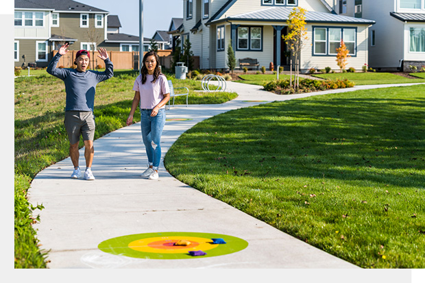 Couple playing games in Reed's Crossing Community in Hillsboro, Oregon