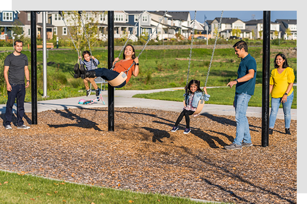 Family swings at Reed's Crossing community Hillsboro, Oregon