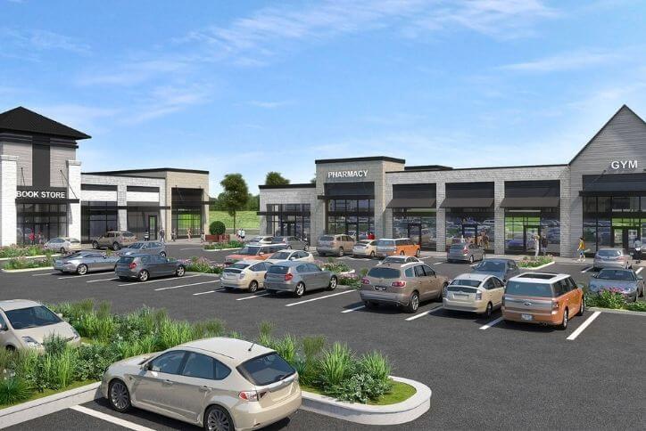 Architectural render of a bookstore, pharmacy, and gym in the Reed’s Crossing Town Center.