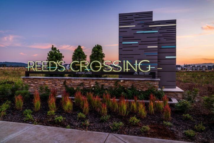 The Reed’s Crossing entry monument at sunset.