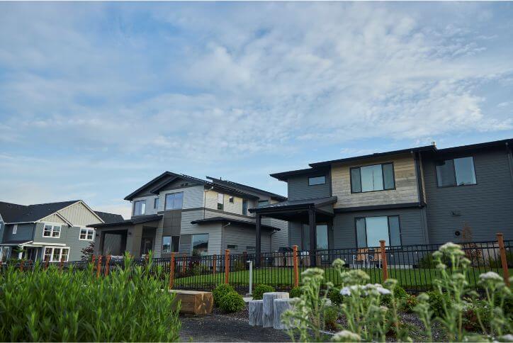 A row of modern, angular homes at Reed’s Crossing, located in South Hillsboro.