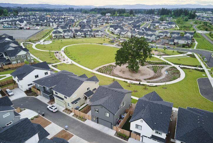 An aerial view of Tamarack Park at Reed’s Crossing with homes circling the park perimeter.