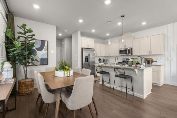 Recessed lighting brightens a clean, organized kitchen.