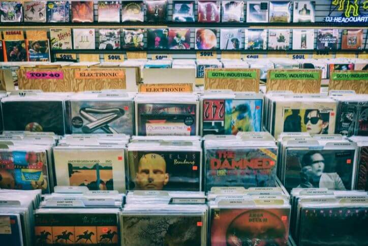 Close-up photo of rows of CDs in an indie record shop.