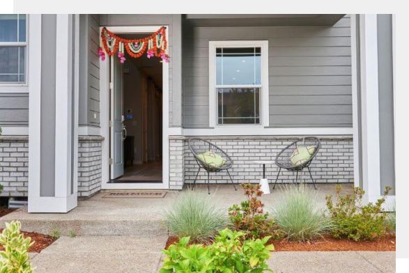 Front porch of model home in Reed's Crossing community in Hillsboro, OR