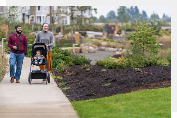 Reed's Crossing family residents walking in community in Hillsboro, OR