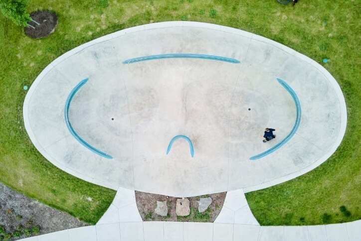 Aerial photo of a skateboarder skating at Tamarack Skatepark in Hillsboro, Oregon.