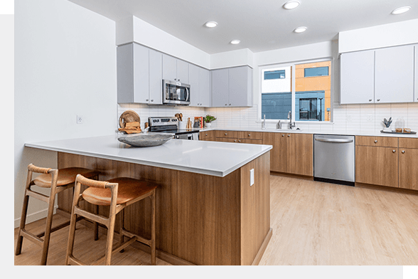 Interior kitchen of Savanna townhomes within Reed's Crossing community in Hillsboro, OR