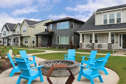 Homes in Reed’s Crossing are situated near community amenities like fire pits and cornholes.