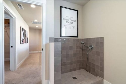 A model home in Reed’s Crossing has a built-in pet washing station for easy cleanups.