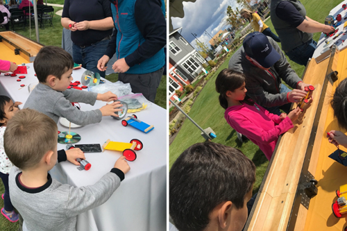 Children build solar-powered cars at the Reed’s Crossing Science & Tech Fest.